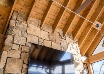 Miller Residence exterior covered porch with television