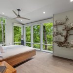 idology-–-hidden-falls-–-kenmure-country-club-–-flat-rock-nc-–-custom-home-–-primary-bedroom-wood-platform-bed-driftwood-wall-art-–-06