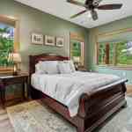 id-ology-–-north-haven-rustic-–-creston-–-black-mountain-nc-–-custom-home-–-bedroom-sleigh-bed-sage-walls-–-06